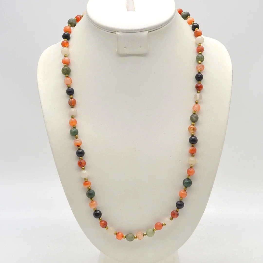 EDELSTEINMIXCOLLIER, RUNDE POLIERTE PERLEN, TRENNPERLEN AUS MESSING, UM 1950, CA. 67 CM. — Necklace — Kunst- und Auktionshaus Kleinhenz