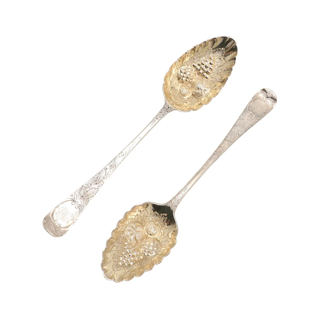 A PAIR OF GEORGE III BERRY SPOONS. — Silver — Lawrences Auctioneers
