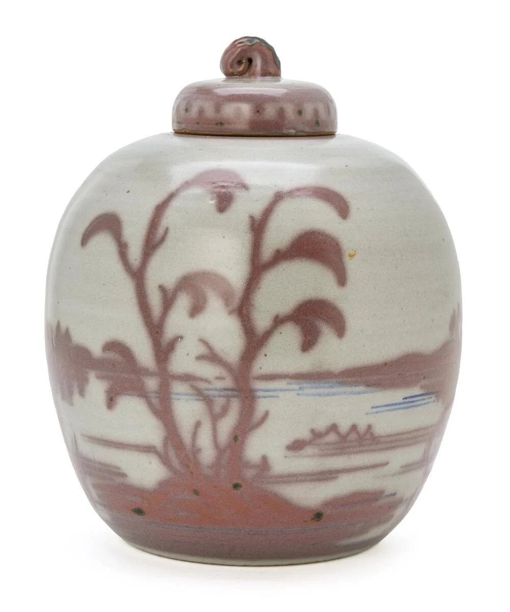 Lidded stoneware jar decorated with pale grey glaze and violet glazed floral motifs with blue elements. Made and marked L. Hjorth, 40/214. H. 23 cm. Diam. 19 cm. — Modern Decorative Art — Bruun Rasmussen