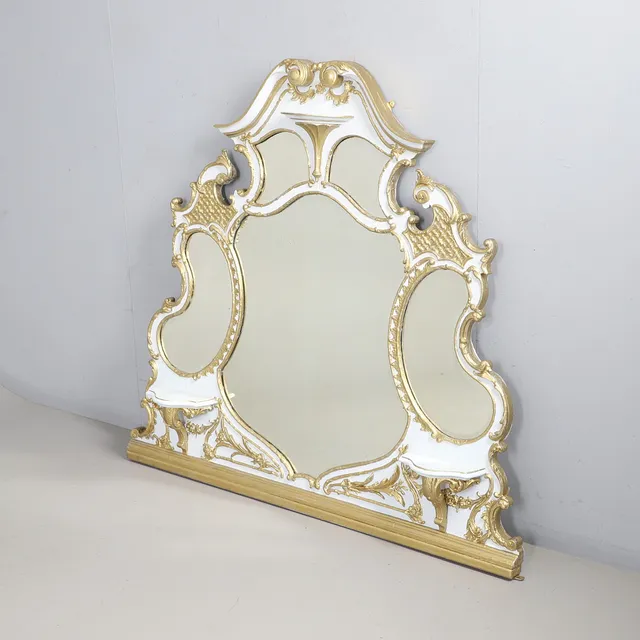 A FRENCH PAINTED AND GILDED OVERMANTEL MIRROR.