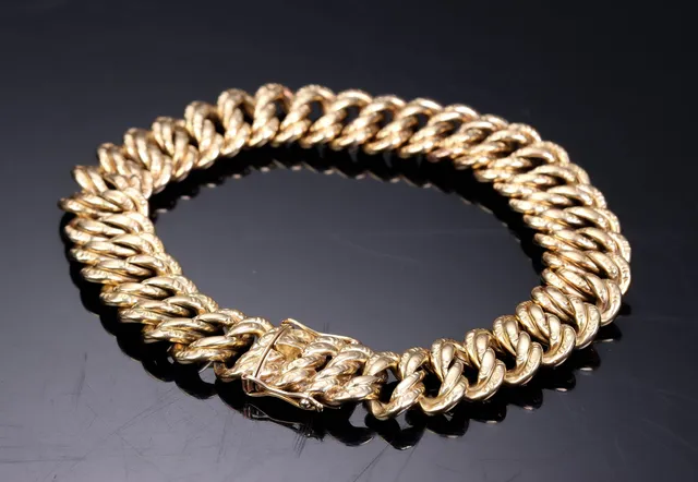 Hugo Grün. Armlænke af 14 kt guld, ca. 29,4 g.