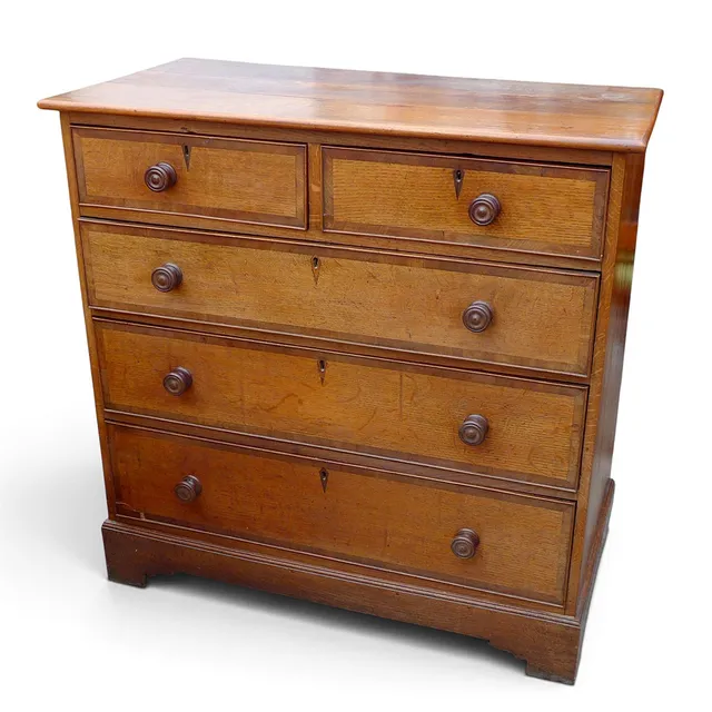 A GEORGE III OAK CHEST.