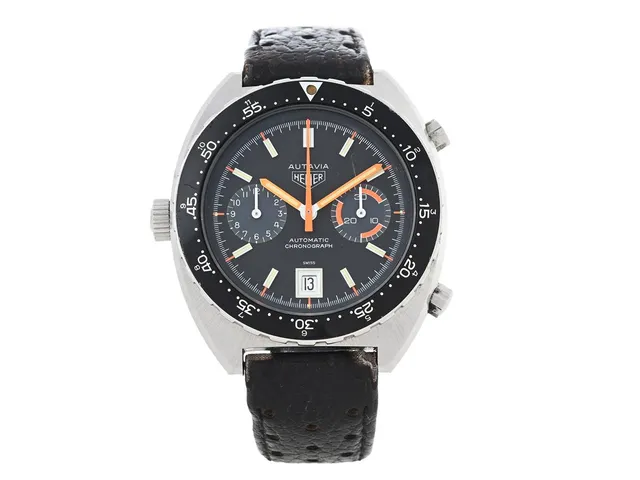 HEUER, Autavia, "Orange Boy", "60 Minutes Bezel", Cal 12, Serie nr. 300956, Ref nr. 11630 MH, kronograf, herrur, 42,5 mm, stål, automatisk (micro-rotor), mineralglas (repor), datum, boett signerad "Heuer-Leonidas SA", läderband, originalspänne, ca 1977.