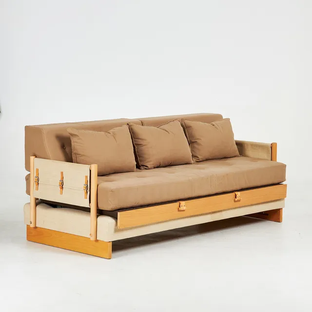 BROR BOIJE. Dagbädd/soffa, Dux, stomme i bok, canvas och textil, detaljer med läderremmar, 3 lösa kuddar, märkt.
