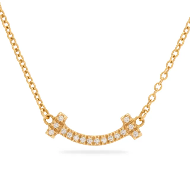 Tiffany T collection, halskæde af 18 kt guld ' Mini T Smile' med 16 brilliantslebet diamanter.