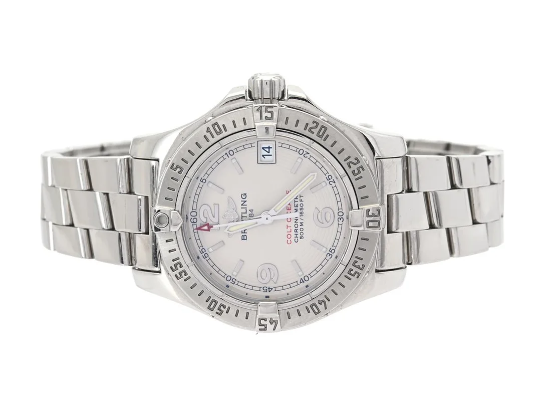 BREITLING, Colt Oceane (500M/1650FT), Chronometre, Cal 77, Verk nr. 1012279, Serie nr. 1125018, Ref nr. A77380, Boett nr. 4122 B5, damur, 33,2 mm, stål, SuperQuartz, safirglas, datum, utbytt urverk/mellanboett (service), Professionallänk II, viklås, Ref nr. W1108/813A, servad oktober 2023, cert, maj 2009, box (skadad), ytterkartong. — Klockor/Breitling — Kaplans