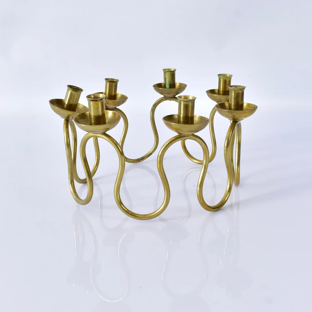 LARS HOLMSTRÖM. Ljusstake, mässing, "Arvika", för Firma svenskt tenn, 1900-tal. — Candlesticks — Halmstads Auktionskammare