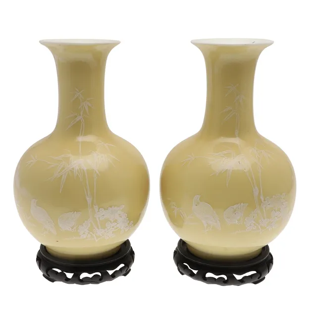 PAIR OF CHINESE SLIP DECORATED PORCELAIN VASES - YELLOW GROUND.