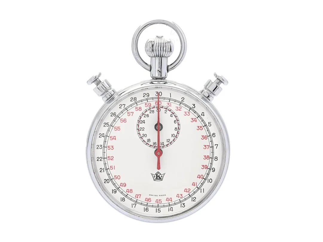 KRONOMETER STOCKHOLM, stoppur, 57 mm, Cal JB 22, Serie nr. 13455113. vitmetall, mekanisk, splittsekund, flyback, gravyr, ca 1970, etui. — Klockor/Kronometer Stockholm — Kaplans