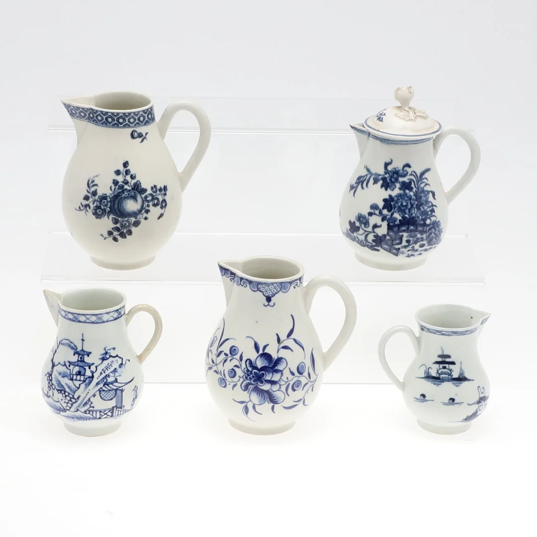 18THC ENGLISH BLUE & WHITE PORCELAIN JUGS. — European — Lawrences Auctioneers