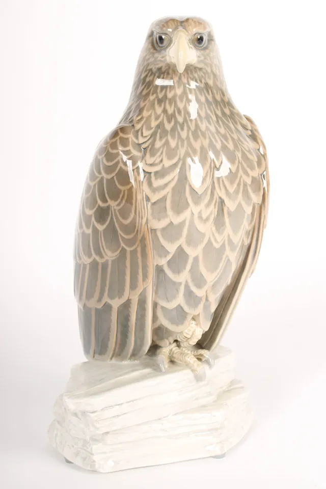 Jens Peter Dahl-Jensen for Bing & Grondahl. Porcelain figurine in the shape of a golden eagle, no. 1795