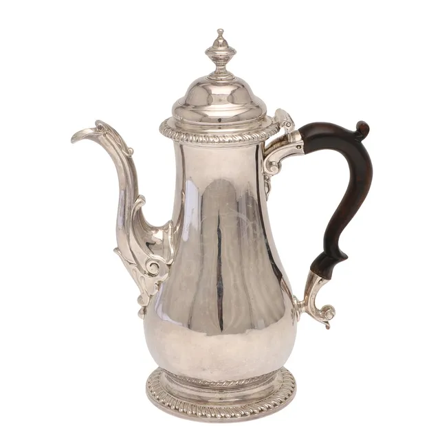 A GEORGE II SILVER COFFEE POT.