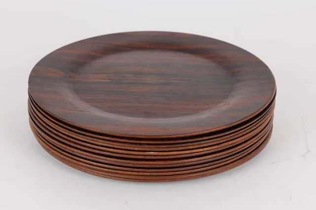 Danish design, approx. 1970.: Set of 12 cover plates made of rosewood.