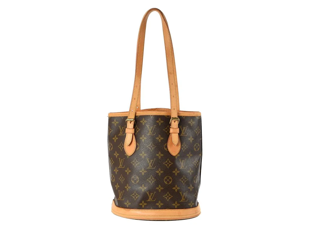 VÄSKA, LOUIS VUITTON, Bucket PM, monogram canvas, 23x26x16 cm, enstaka fläckar på skinndetaljer. — Accessoarer/Väskor — Kaplans