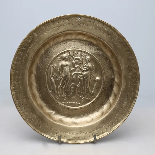 Charity plate in Dinand or Nuremberg brass, 16th Century.