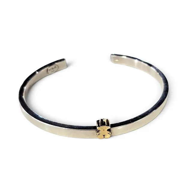TOUS. Pulsera en plata de Ley con osito chapado en oro amarillo.