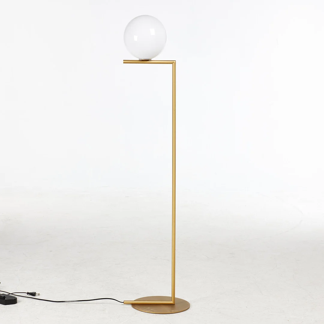 MICHAEL ANASTASSIADES. "'IC Lights F1'' golvlampa, Flos, klotformad skärm av opalglas, stomme i borstad mässing, samtida tillverkning. — Floor lights — Stockholms Auktionsverk Sickla