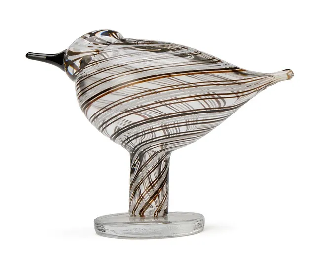Clear glass bird figure with brown and white patterns. Stamped O. Toikka, Nuutajärvi. With label from Iittala, Finland. H. 13 cm. L. 16.5 cm.