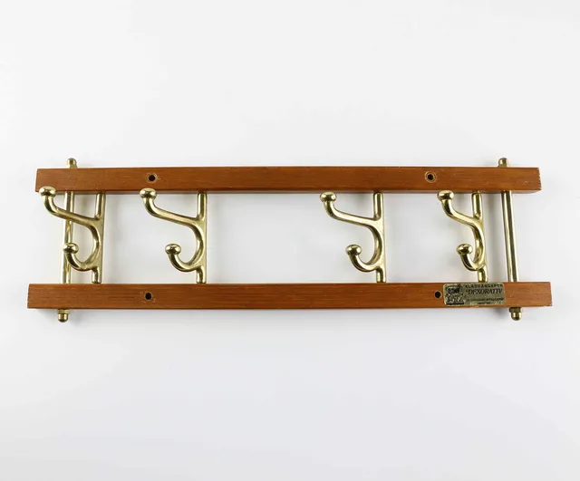 KLÄDHÄNGARE, "Dekorativ", Ab Skoglunds Metallgjuteri, Anderstorp, etikettmärkt, 1950/60-tal.