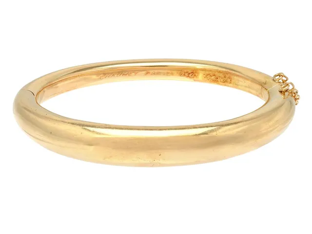 CHAUMET, armring, 18K guld, serienr. 156003, stl 6,0x5,0 cm, vikt 39,1 g, trögt lås, slitet originaletui.