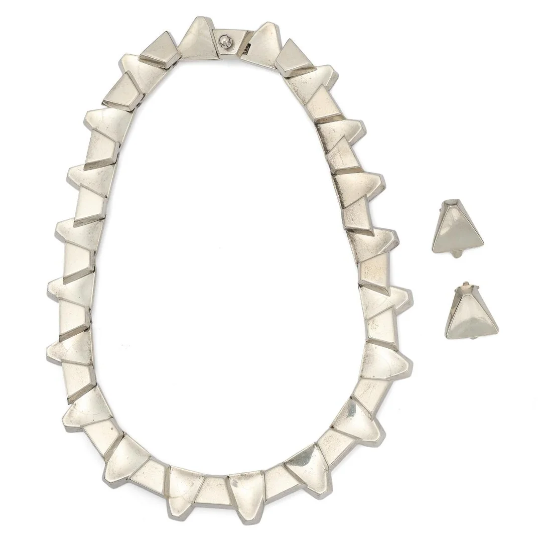 A jewellery set comprising of a pair of ear clips and a necklace of sterling silver. Design no. 38. Ear clips. 18 mm. Necklace L. 41 cm. (3) — Jewellery/Necklaces & pendants — Bruun Rasmussen