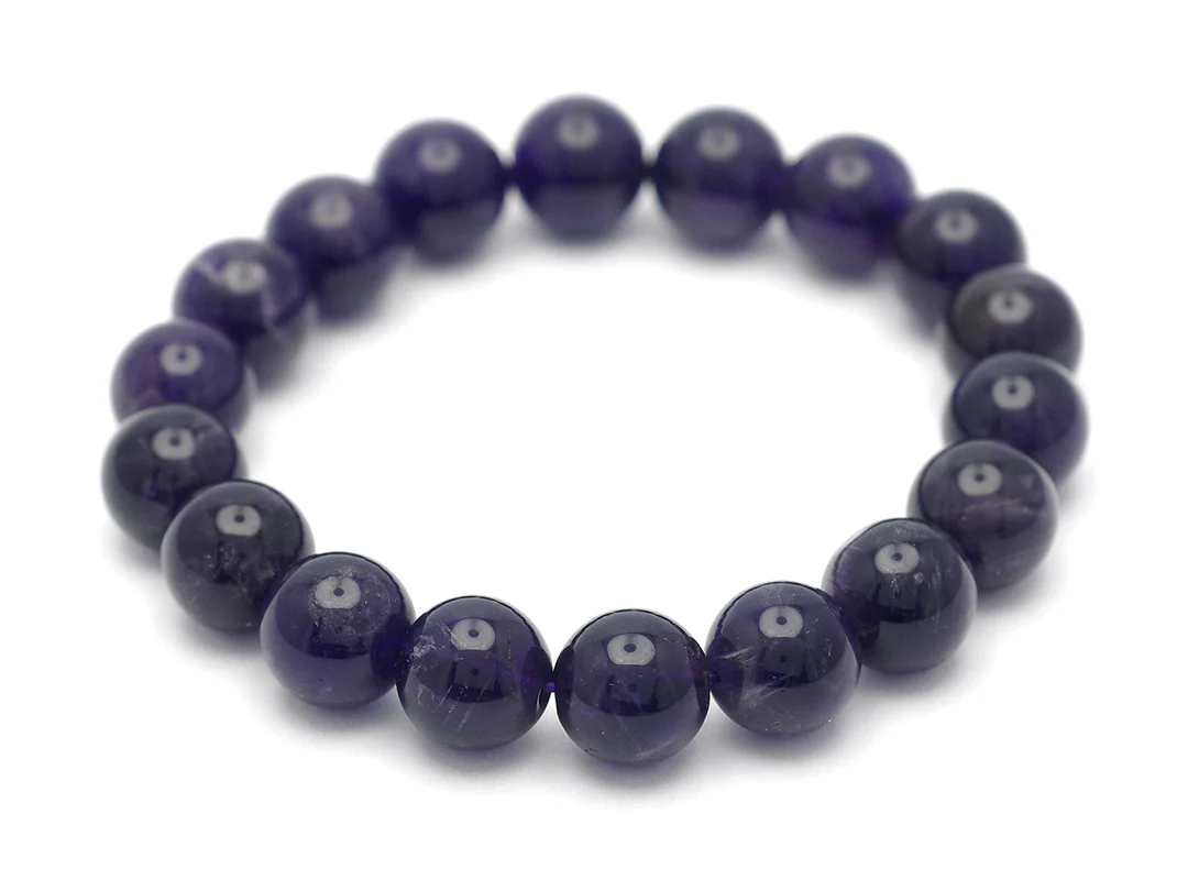 ARMBAND, ametister, ca 10 mm, längd ca 17 cm, elastiskt. — Smycken/Armband — Kaplans