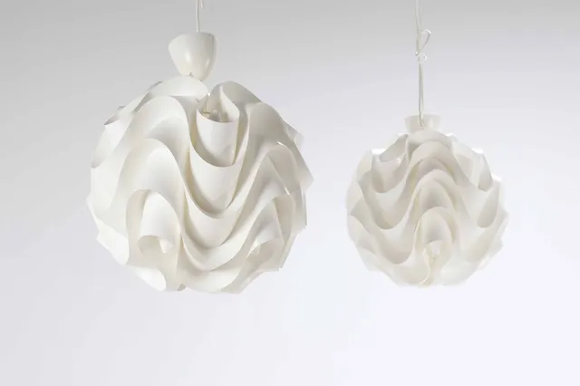 Poul Christiansen for Le Klint: A pair of 'Sinus' pendants (2)