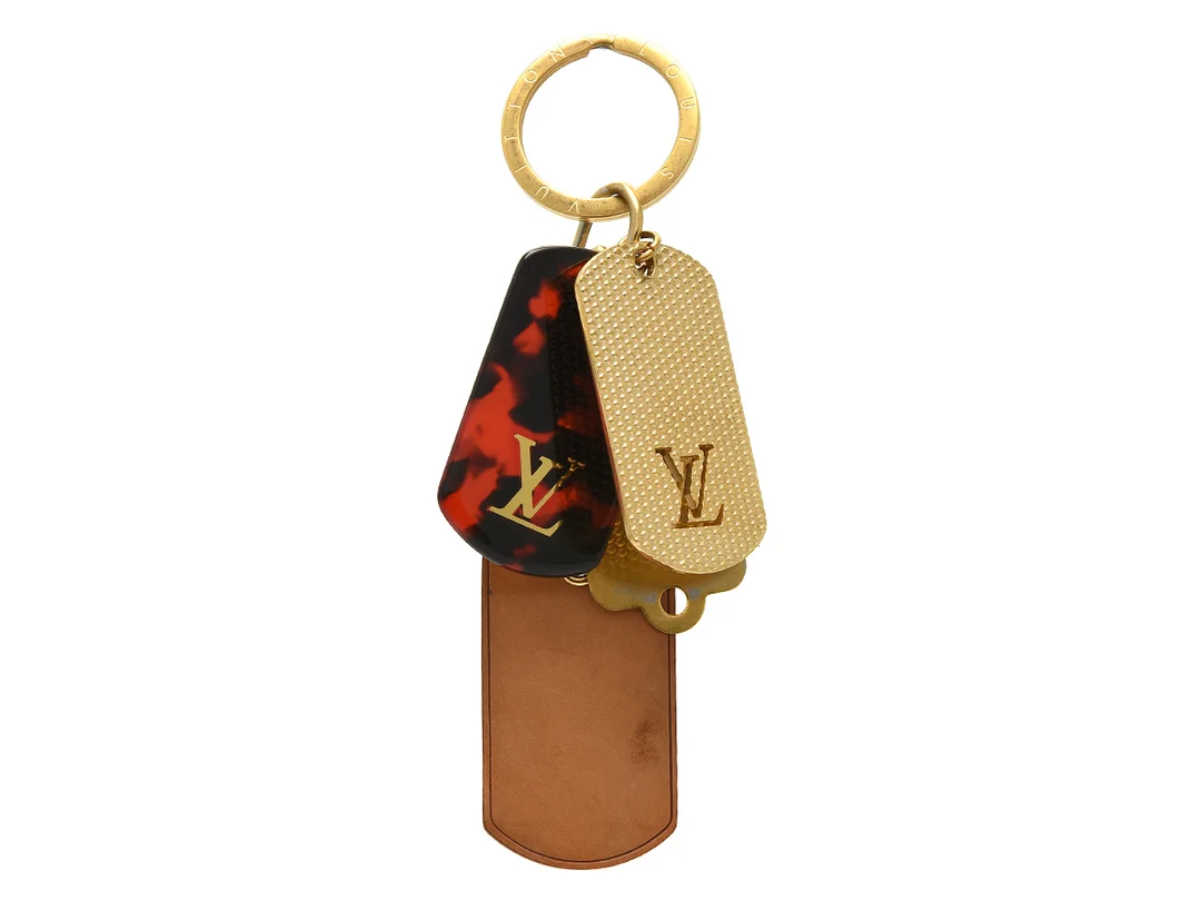 NYCKELRING/VÄSKSMYCKE, LOUIS VUITTON, key ring/bag charm, gulmetall, Murakami edition. — Accessoarer/Nyckelringar — Kaplans