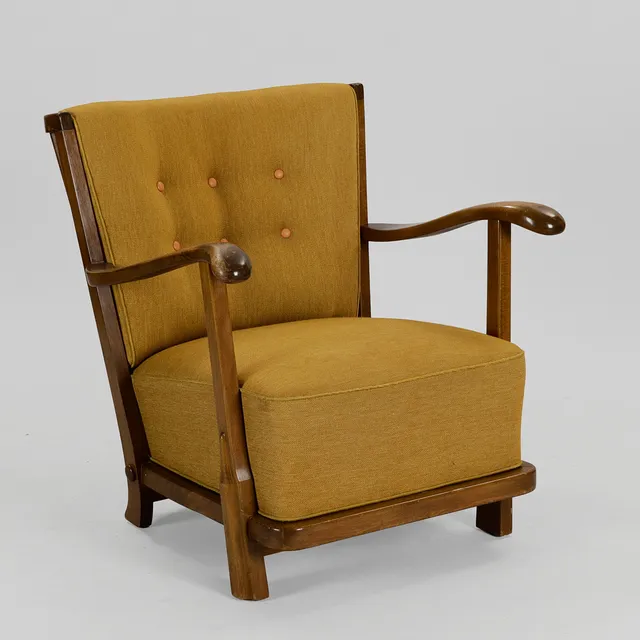 FRITS SCHLEGEL (1896-1965). Lænestol med stel og armlæn af bøg, løse hynder betrukket med uld, Fritz Hansen, model '1594', Danmark, 1930/1940'erne.