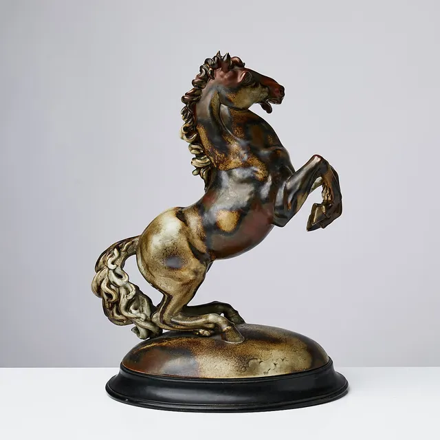 KARL GRÖSSL. "Sverige", figurin, porslin, Rörstrand, i form av häst, på träsockel, signerad i botten.