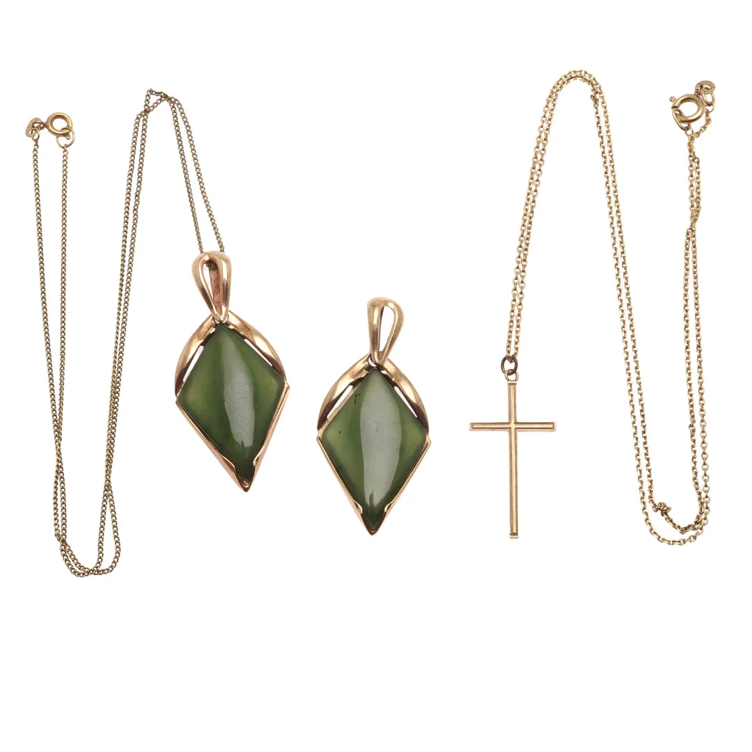 TWO JADE AND 9CT GOLD PENDANTS AND A 9CT GOLD CRUCIFORM PENDANT. — Brooches & Pendants — Lawrences Auctioneers