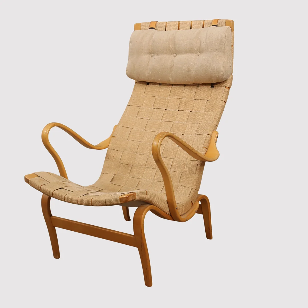 BRUNO MATHSSON. Fåtölj, "Pernilla", stomme i bok med flätad sadelgjord, Firma Karl Mathsson by Dux. — Armchairs & Chairs — Limhamns Auktionsbyrå