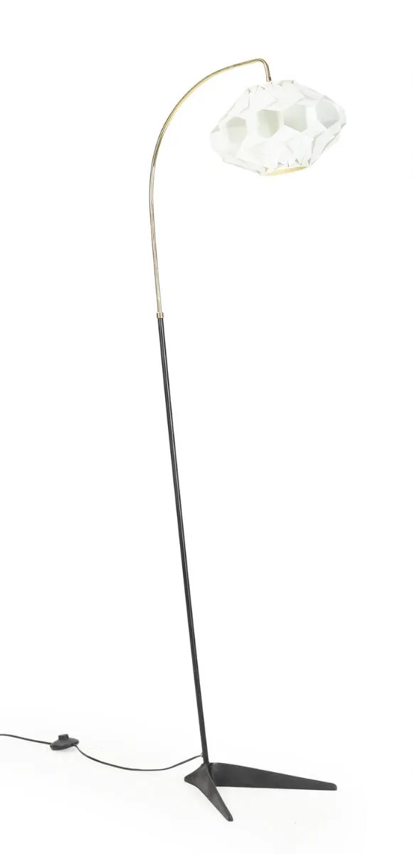 An adjustable brass and black lacquered metal floor lamp with iron base, mounted with white acrylic shade. 1950s. H. 158 cm.