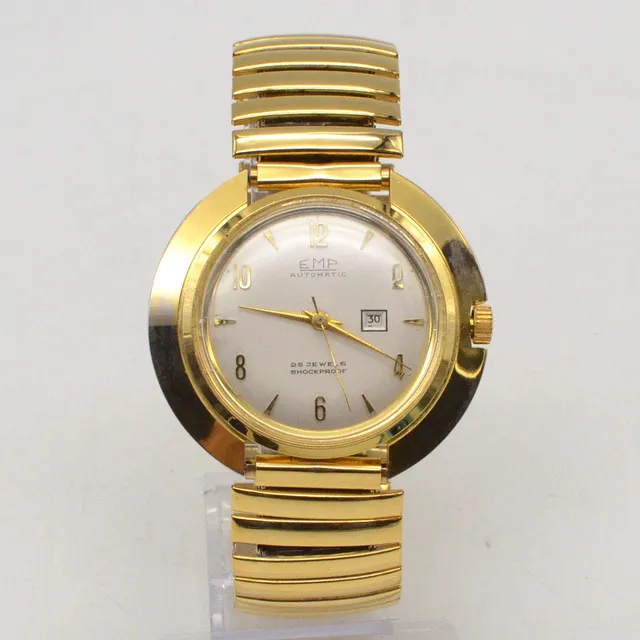 EMP AUTOMATIC, 25 JEWELS, HERRENARMBANDUHR AUS DEN 1960ER JAHREN, GEHÄUSE UND FLEXBAND VERGOLDET, DAYDATE, HANDAUFZUG.