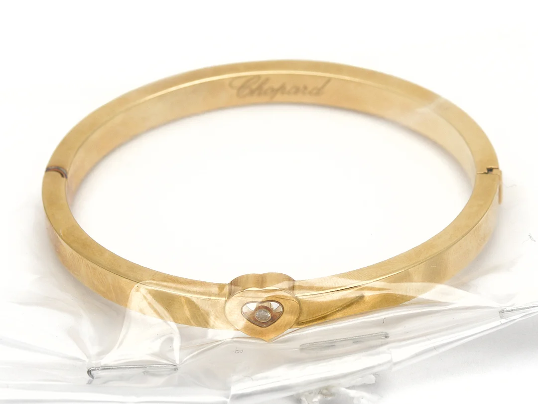 Armband, Chopard Happy Diamond Ø6,5cm 18K 33,7g med diamant 0,03ct — Smycken/Armband — Kaplans