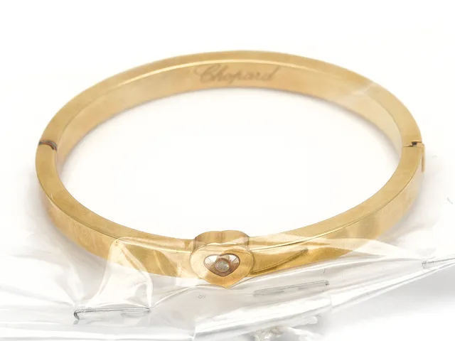 Armband, Chopard Happy Diamond Ø6,5cm 18K 33,7g med diamant 0,03ct