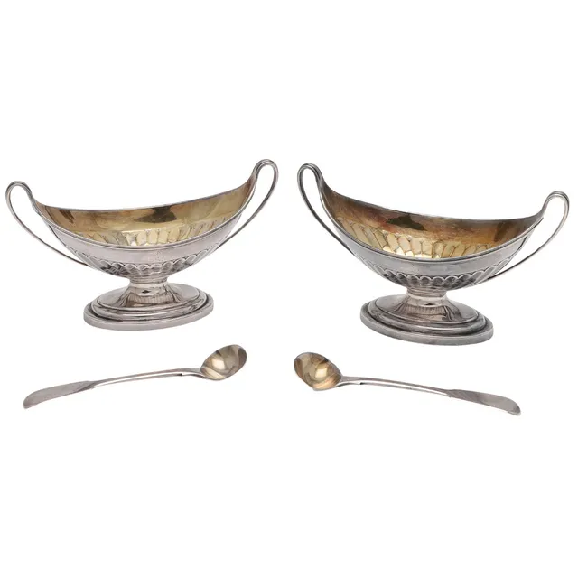 A PAIR OF GEORGE III SILVER PEDESTAL SALTS.