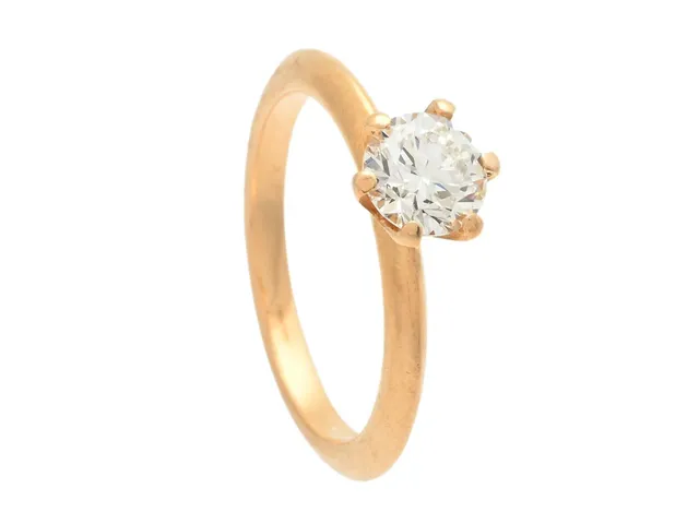 ENSTENSRING, 18K vitguld, briljantslipad diamant 0,70 ct, W(H)VVS2, inskription IGI 395966136, stl 16,25 mm, vikt 3,3 g.