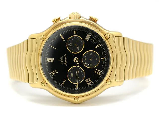 EBEL, Sport Classic, "Tachymetre", Cal 134 (Zenith), Serie nr. 64106392, Ref nr. 8134901, kronograf, herrur, 39,5 mm, 18K guld, automatisk, safirglas, datum, integrerad originallänk, viklås, totalvikt 156,8 gram, ca 1990, box.