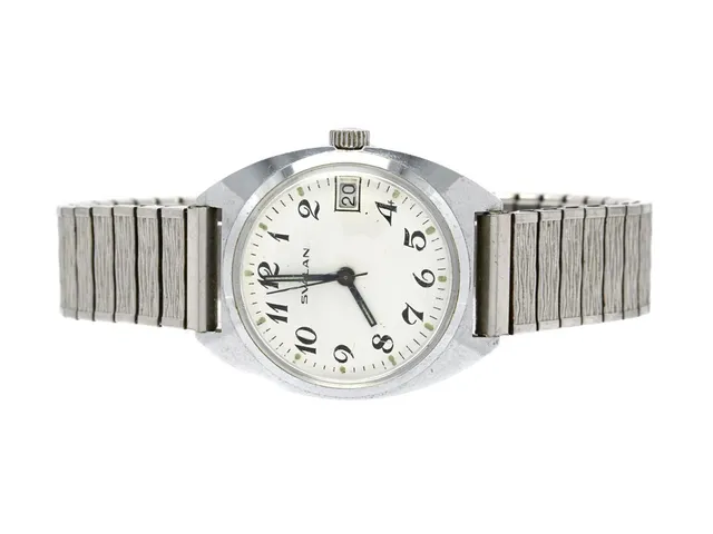 SVALAN, herrur, 32 mm, vitmetall, manuell, plexiglas, datum, ca 1970, metallänk ej originallänk.