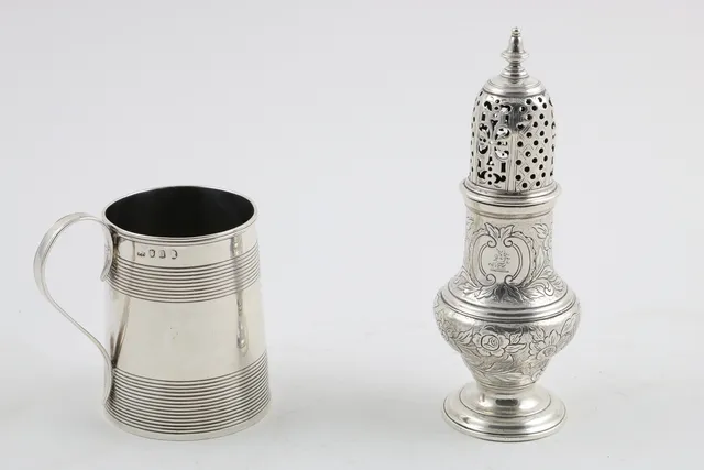 A GEORGE II SUGAR CASTER.