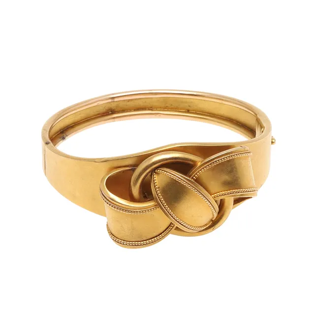 A VICTORIAN GOLD BANGLE.