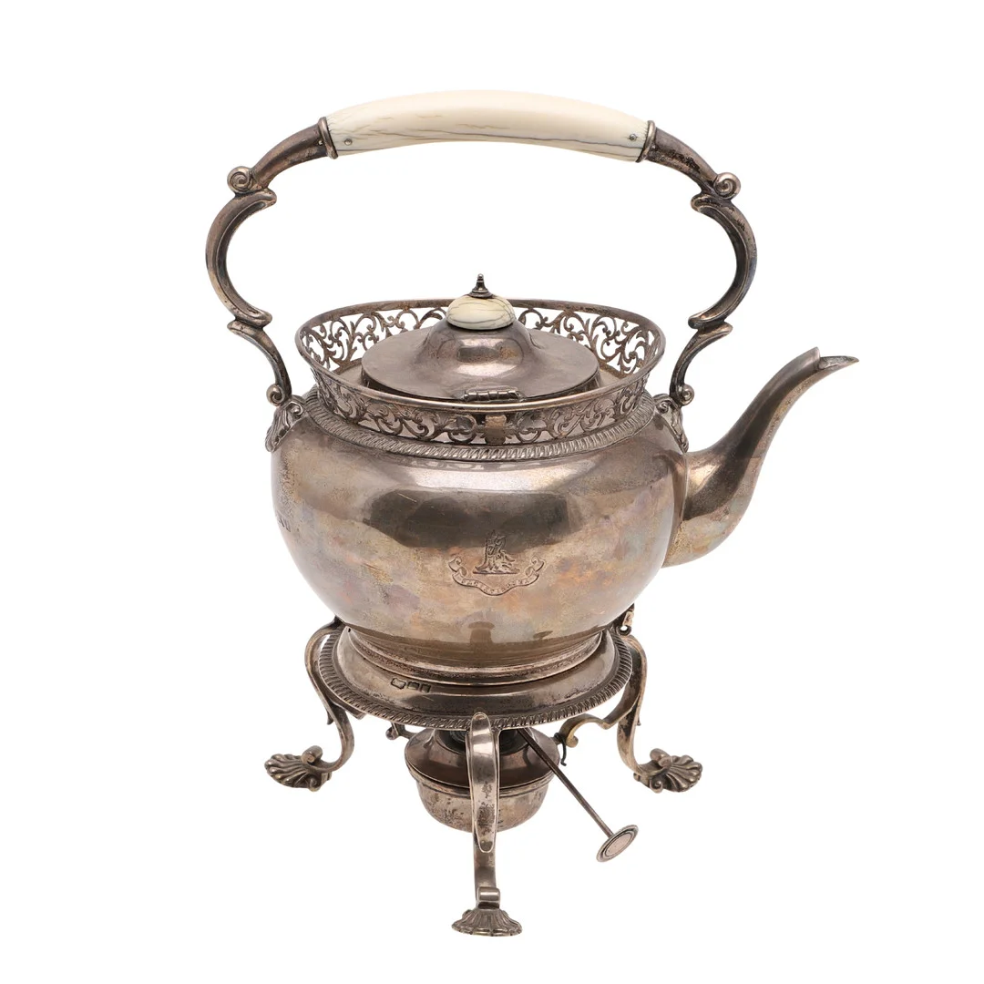 AN EDWARDIAN SILVER KETTLE ON STAND. — Silver — Lawrences Auctioneers