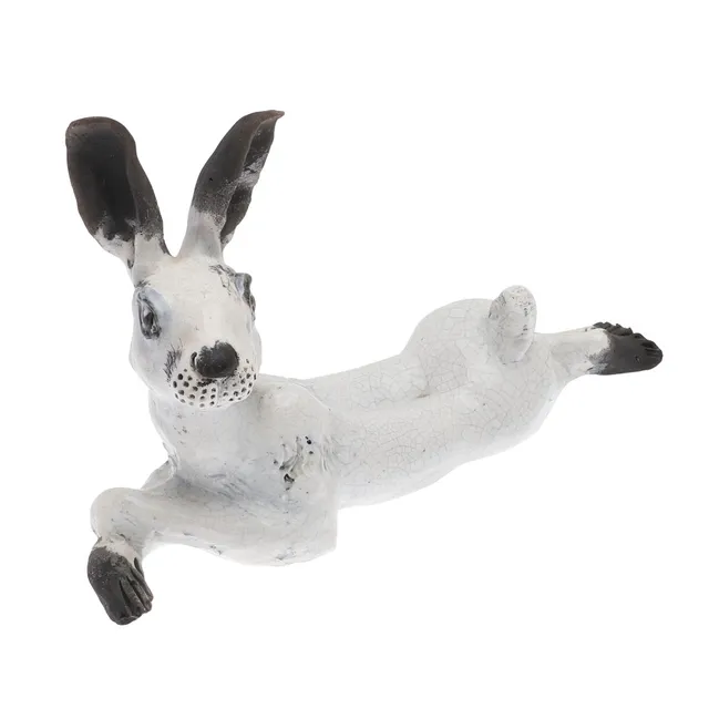 LAWSON E. RUDGE (B. 1936). RAKU STUDIO POTTERY FIGURE OF A HARE.