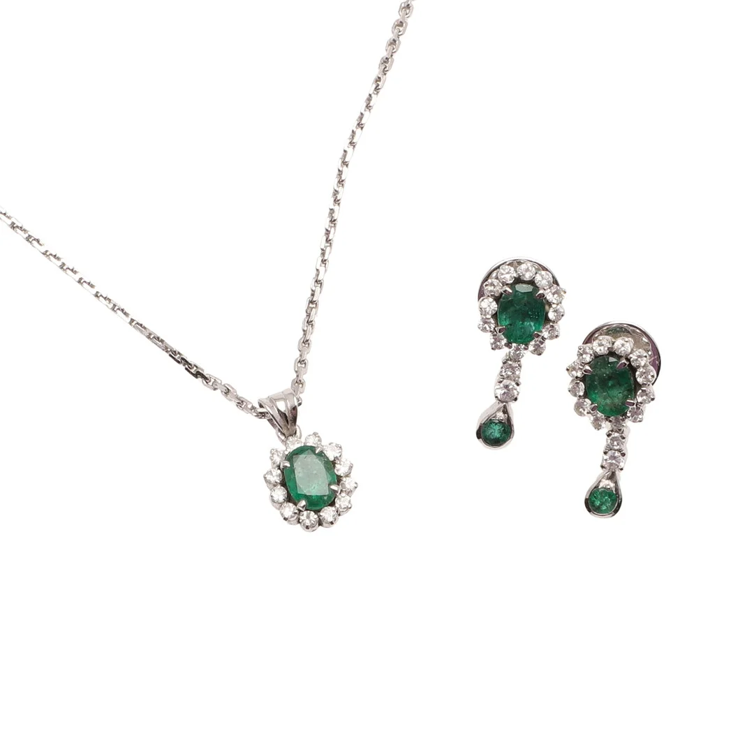 AN EMERALD & DIAMOND CLUSTER PENDANT AND EARRINGS. — Necklace — Lawrences Auctioneers