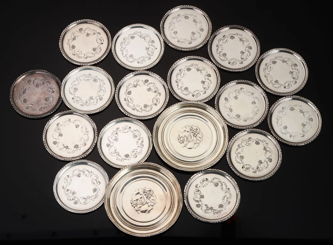 Georg Jensen. A set of sterling silver glass/bottle trays, design no. 41/51 (18) — Silver, bronze, copper and pewter/Other silver — Lauritz