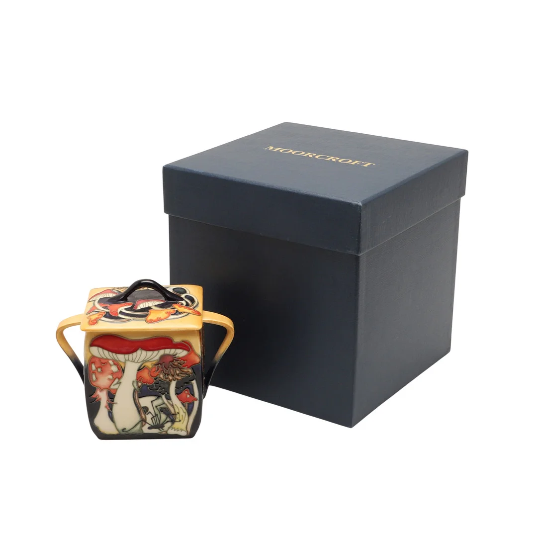 MOORCROFT LIDDED JAR - TOADSTOOL CARNIVAL. — European — Lawrences Auctioneers