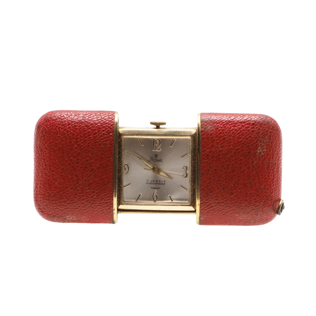 STOWA A MID CENTURY PURSE WATCH. — Other clocks — Lawrences Auctioneers