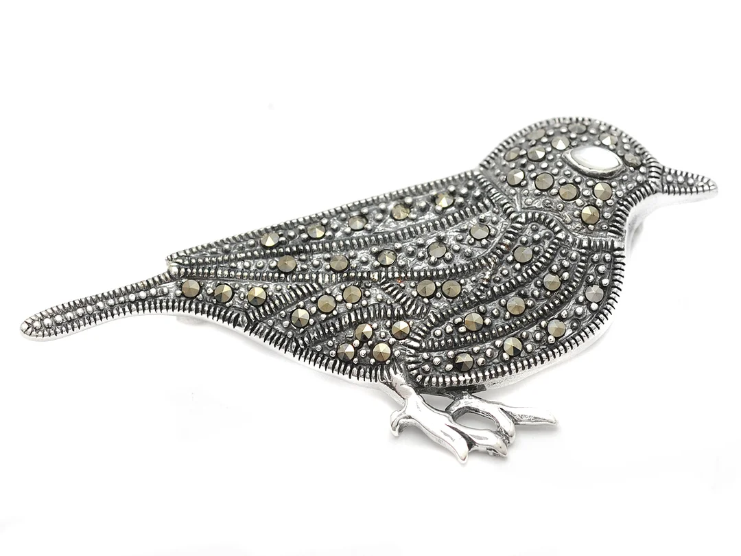 BROSCH, fågel, sterling silver, markasiter, 6 cm, vikt 9,8 g. — Smycken/Brosch — Kaplans