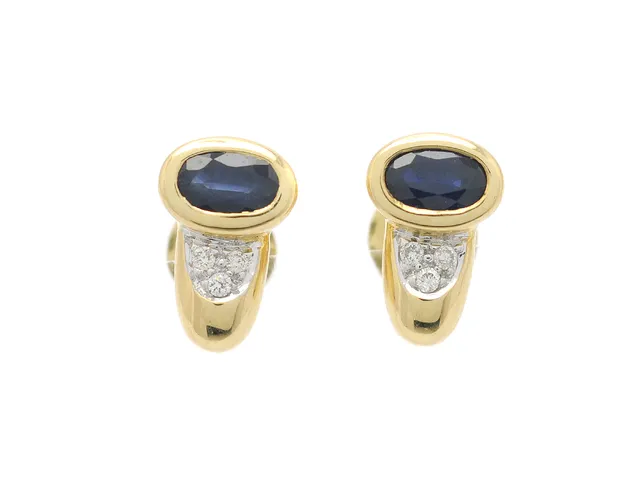 ÖRHÄNGEN, 18K guld, 2 ovalt fasetterade blå safirer, 6 briljantslipade diamanter ca 0,04 ctv, ca CR-TCA/VS, vikt 2,8 g, stift.
